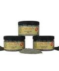 Dixie Belle Paint Dixie Dirt-4oz. 
Image shows 3 containers of Dixie Dirt stacked on top of eachother with the different colored powder surrounding them. The colors that are shown are; Ash ,Earth, and Charcoal.