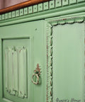 Dixie Belle Paint Farmhouse Green Chalk Mineral Paint is the perfect paint for any DIY project!
Upclose image of a Credenza door painted in Farmhouse Green Chalk Mineral Paint with distressed accents.