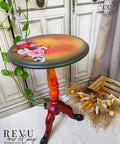 Dixie Belle Paint Florida Orange Chalk Mineral Paint - a coffee table chalk painted with numerous colors included Florida Orange Chalk paint. The Flower Child Rub on Furniture Transfer was added to the top.