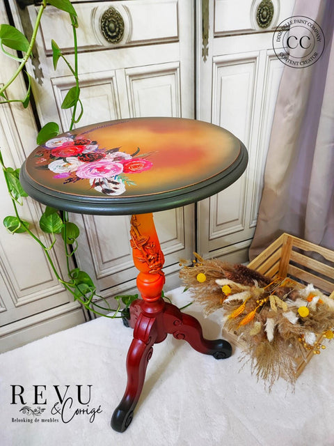 Dixie Belle Paint Florida Orange Chalk Mineral Paint - a coffee table chalk painted with numerous colors included Florida Orange Chalk paint. The Flower Child Rub on Furniture Transfer was added to the top.