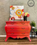 Dixie Belle Paint Florida Orange Chalk Mineral Paint is the perfect paint for any DIY project! A Bombay chest chalk painted with Florida Orange chalk paint staged with vases and a canvas painting with florida orange chalk paint.
