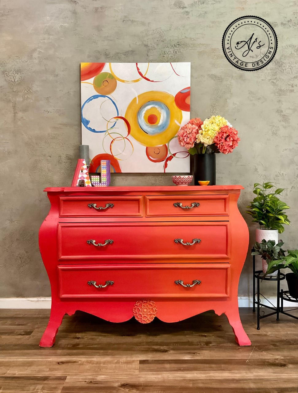 Dixie Belle Paint Florida Orange Chalk Mineral Paint is the perfect paint for any DIY project! A Bombay chest chalk painted with Florida Orange chalk paint staged with vases and a canvas painting with florida orange chalk paint.