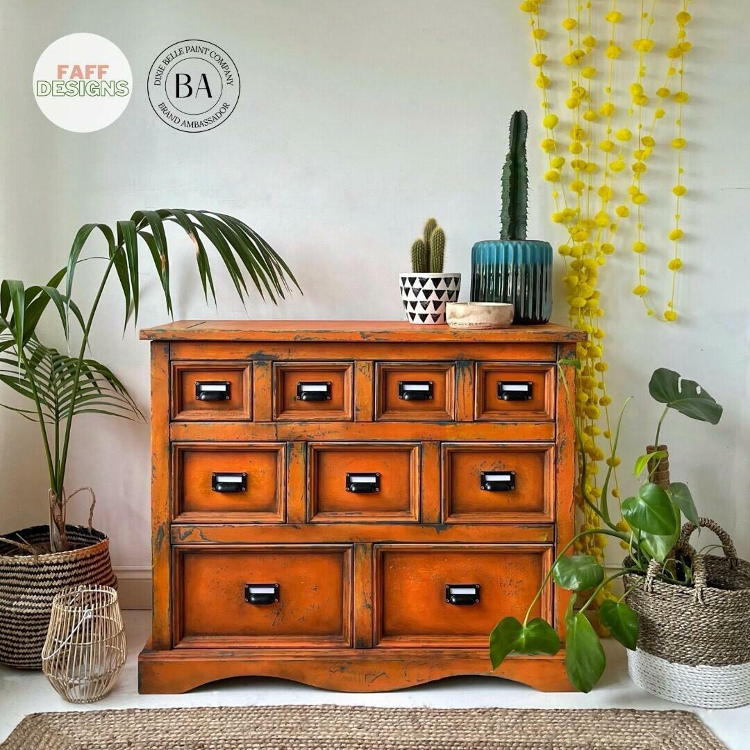 Dixie Belle Paint Florida Orange Chalk Mineral Paint is the perfect paint for any DIY project! An apothecary dresser chalk painted with Florida orange chalk paint and dark glaze.