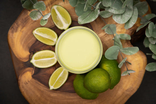 Dixie Belle Paint Limeade Chalk Mineral Paint is the perfect paint for any DIY project!
Opened container of Dixie Belle Paint Limeade Chalk Mineral Paint is the perfect paint for any DIY project! staged around the container are sliced limes and 3 whole limes with greenery on top of a wooden board.