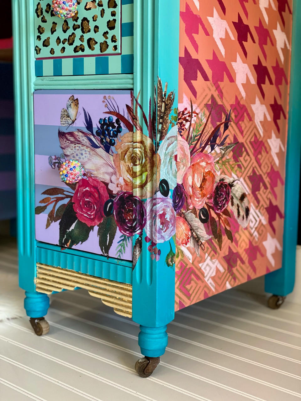 Dixie Belle Paint Lucky Lavender Chalk Mineral Paint is the perfect paint for any DIY project!
Bedside table with blue framing and side panel orange with Houndstooth - Stencil, and bottom drawer with Lucky Lavender Chalk Mineral Paint striped with a mute blue. with Flower Child Transfer on both the front and side.