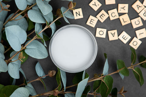 Dixie Belle Paint Manatee Gray Chalk Mineral Paint is the perfect paint for any DIY project! Can of Chalk Mineral Paint with tile letters and leaves in the background.