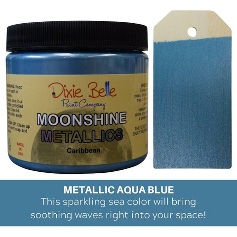 Metallic Aqua Blue Moonshine metallic is the perfect paint to add shimmer and shine to your chalk painted furniture. 16 oz. Jar of Caribbean Moonshine Metallic next to a sample on wood.