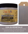 Silver Bullet Moonshine metallic is the perfect paint to add shimmer and shine to your chalk painted furniture. 16 oz. Jar of Rozay Moonshine Metallic next to a sample on wood.