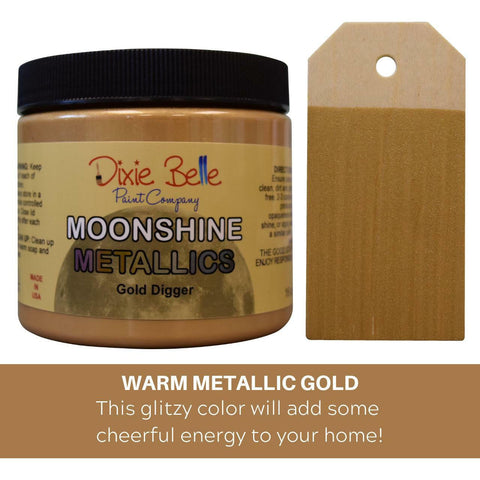 Metallic Gold Moonshine metallic is the perfect paint to add shimmer and shine to your chalk painted furniture. Warm metallic gold, this glitzy color will add some cheerful energy to your home. 16 oz. Jar of Gold Digger Moonshine Metallic next to a sample on wood.
