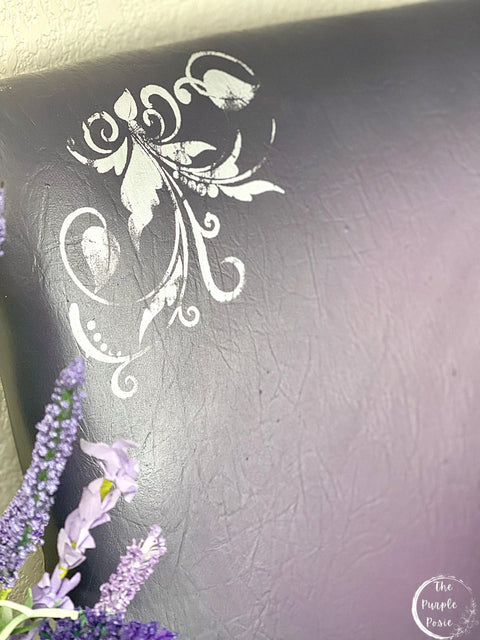 Moonshine metallic is the perfect paint to add shimmer and shine to your chalk painted furniture. Purple metallic chalk painted chair with white florally stencil.