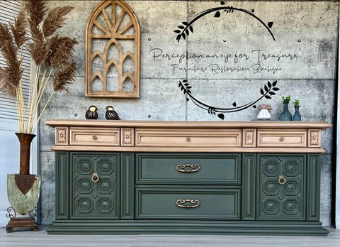 Dixie Belle Paint Mud Puddle Chalk Mineral Paint is the perfect paint for any DIY project! Dresser with bottom half painted green and top half painted in Dixie Belle Paint Mud Puddle Chalk Mineral Paint. Staged with bird figures and a plant.