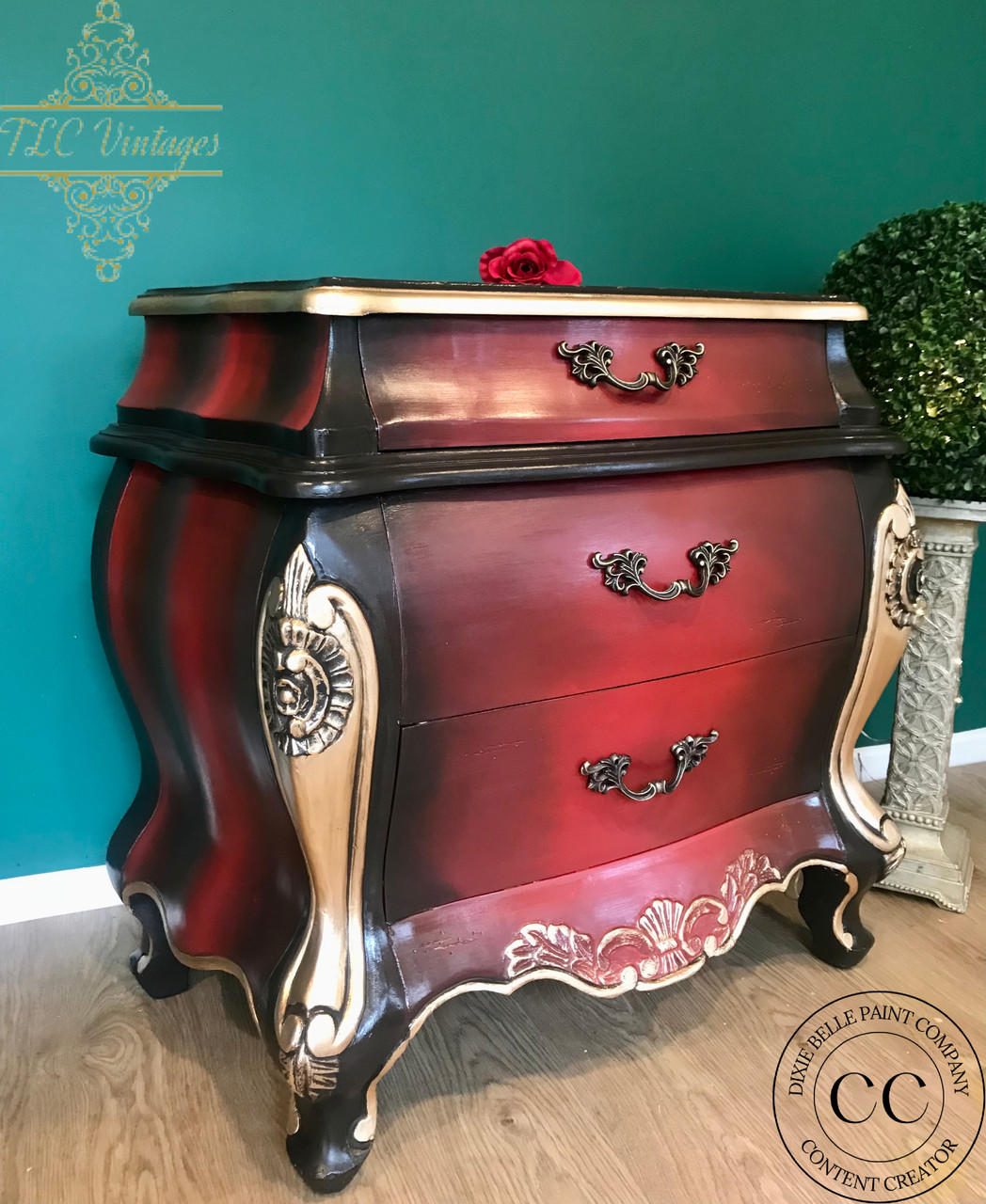 Dixie Belle Paint Muscadine Wine Chalk Mineral Paint is the perfect paint for any DIY project! Dark Red Chalk mineral Paint end table with gold and black blended paint.