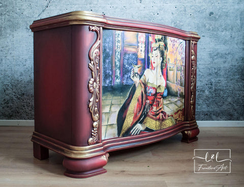 Dixie Belle Paint Muscadine Wine Chalk Mineral Paint is the perfect paint for any DIY project! Dark Red Chalk mineral Paint end table with gold and black accents painted on.  With an Asian woman on the front doors.