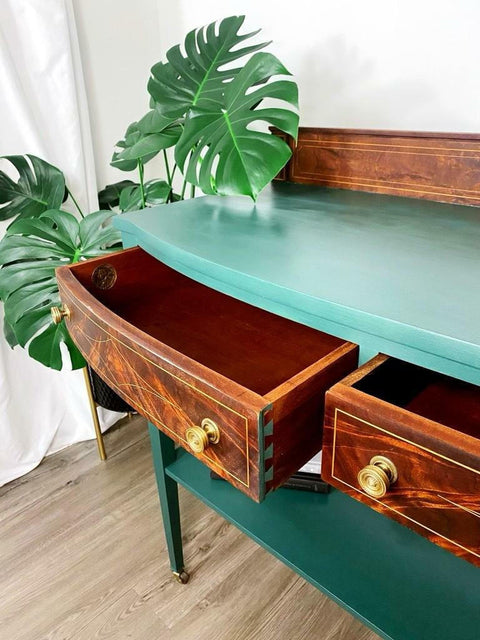 Dixie Belle Paint Palmetto Chalk Mineral Paint is the perfect paint for any DIY project! Close up of a Green chalk painted  dresser, with natural wood drawers pulled out with gold hardware.