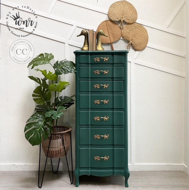 Dixie Belle Paint Palmetto Chalk Mineral Paint is the perfect paint for any DIY project! Green chalk painted tall lingerie dresser. Staged with potted plant, brass duck book ends and books.