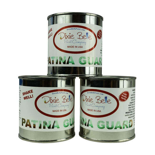 Dixie Belle Paint Patina Guard. 3 Cans of Patina guard stacked on top of each other.