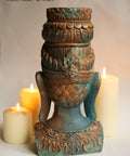 Dixie Belle Paint Patina Paint. Back of Buddha head painted and sprayed to look rusty. Staged in front of candles.
