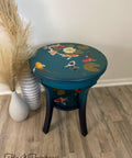 Dixie Belle Paint Peacock Chalk Mineral Paint is the perfect paint for any DIY project! Blue chalk painted end table with koi fish rub on transfers.