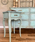 Dixie Belle Paint Pearlescent Glaze. blue chalk painted end table and dresser with Pearlescent Glaze on them.
