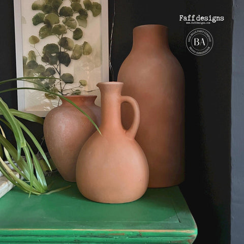 Dixie Belle Paint Pine Cone Chalk Mineral Paint is the perfect paint for any DIY project! Light brown Chalk mineral painted vases made to look like clay vases.