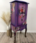 Dixie Belle Paint Plum Crazy Chalk Mineral Paint is the perfect paint for any DIY project! Purple chalk painted jewelry box blended with maroon chalk paint, floral rub on transfers and brown painted feet. Staged with a vase with faux wheat.
