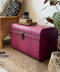 Dixie Belle Paint Plum Crazy Chalk Mineral Paint is the perfect paint for any DIY project! Maroon chalk painted trunk with bronze hard ware and black blended to give it an old look. Staged with book and a black flower pot.