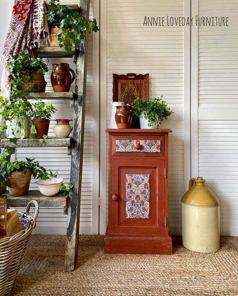 Dixie Belle Paint Rustic Red Chalk Mineral Paint is the perfect paint for any DIY project! A single bedside cabinet featuring the rustic red with a decoupage on the front of the drawer and cabinet.