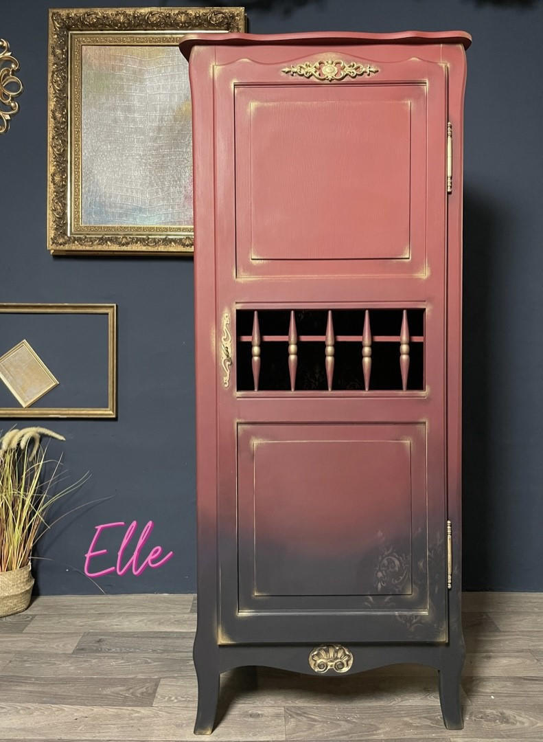 Dixie Belle Paint Rusty Nail Chalk Mineral Paint is the perfect paint for any DIY project! A tall hutch that has the rusty nail painted on top and is blended into a dark black color.