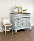 Dixie Belle Paint Savannah Mist Chalk Mineral Paint is the perfect paint for any DIY project! An end table that is painted in the light blue color, savannah mist.