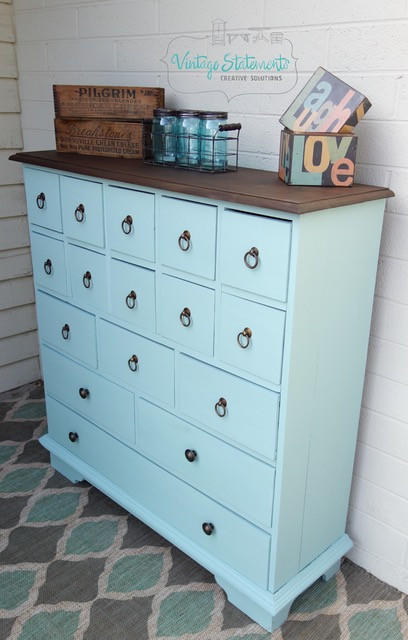 Dixie Belle Paint Sea Glass Chalk Mineral Paint is the perfect paint for any DIY project! A dresser with 17 drawers painted in sea glass.