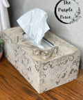 Dixie Belle Paint Sea Spray creates a chippy, textured & weathered look when mixed with your favorite Dixie Belle color. A beige painted tissue box with a stencil in a darker brown with sea spray added to show texture.