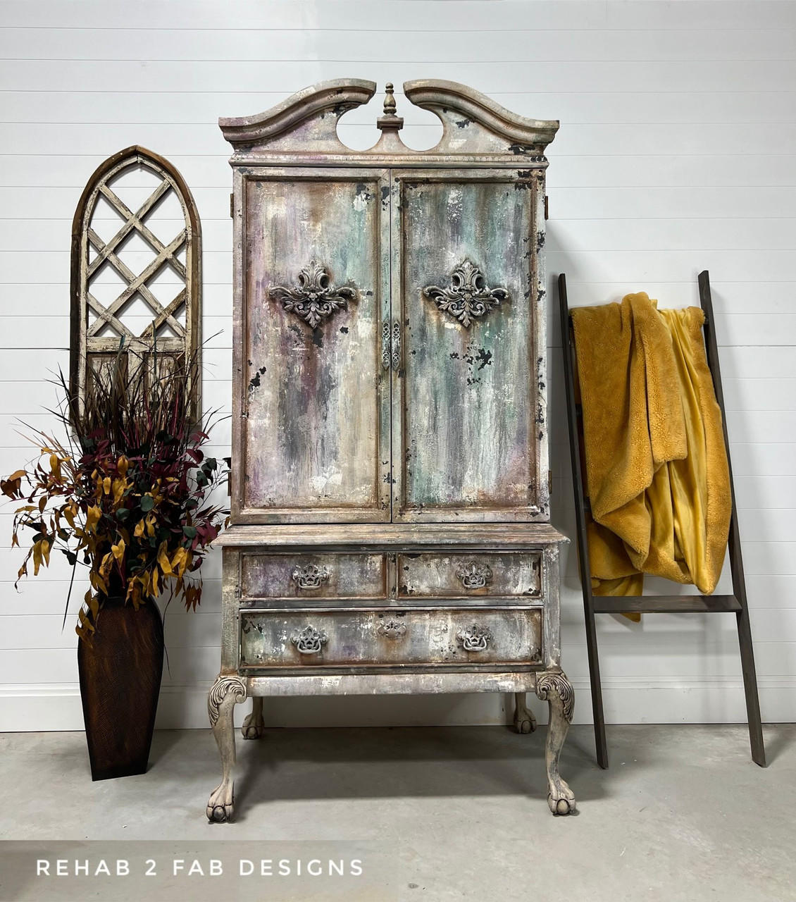 Dixie Belle Paint Sea Spray creates a chippy, textured & weathered look when mixed with your favorite Dixie Belle color. An armoire that has multiple colors and is very grunge and chippey.