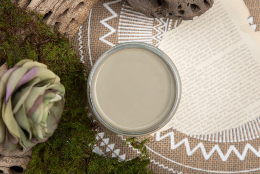 Dixie Belle Paint Spanish Moss Chalk Mineral Paint is the perfect paint for any DIY project! A staged product image of an open can of paint, spanish moss chalk mineral paint.