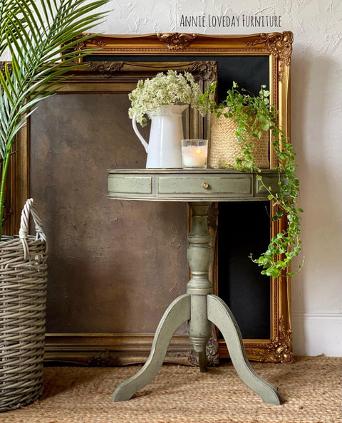 Dixie Belle Paint Spanish Moss Chalk Mineral Paint is the perfect paint for any DIY project! An end table painted in spanish moss chalk mineral paint and is distressed.