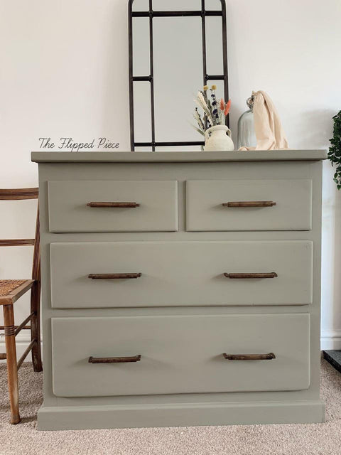Dixie Belle Paint Spanish Moss Chalk Mineral Paint is the perfect paint for any DIY project! A dresser with 4 drawers painted in spanish moss chalk mineral paint.