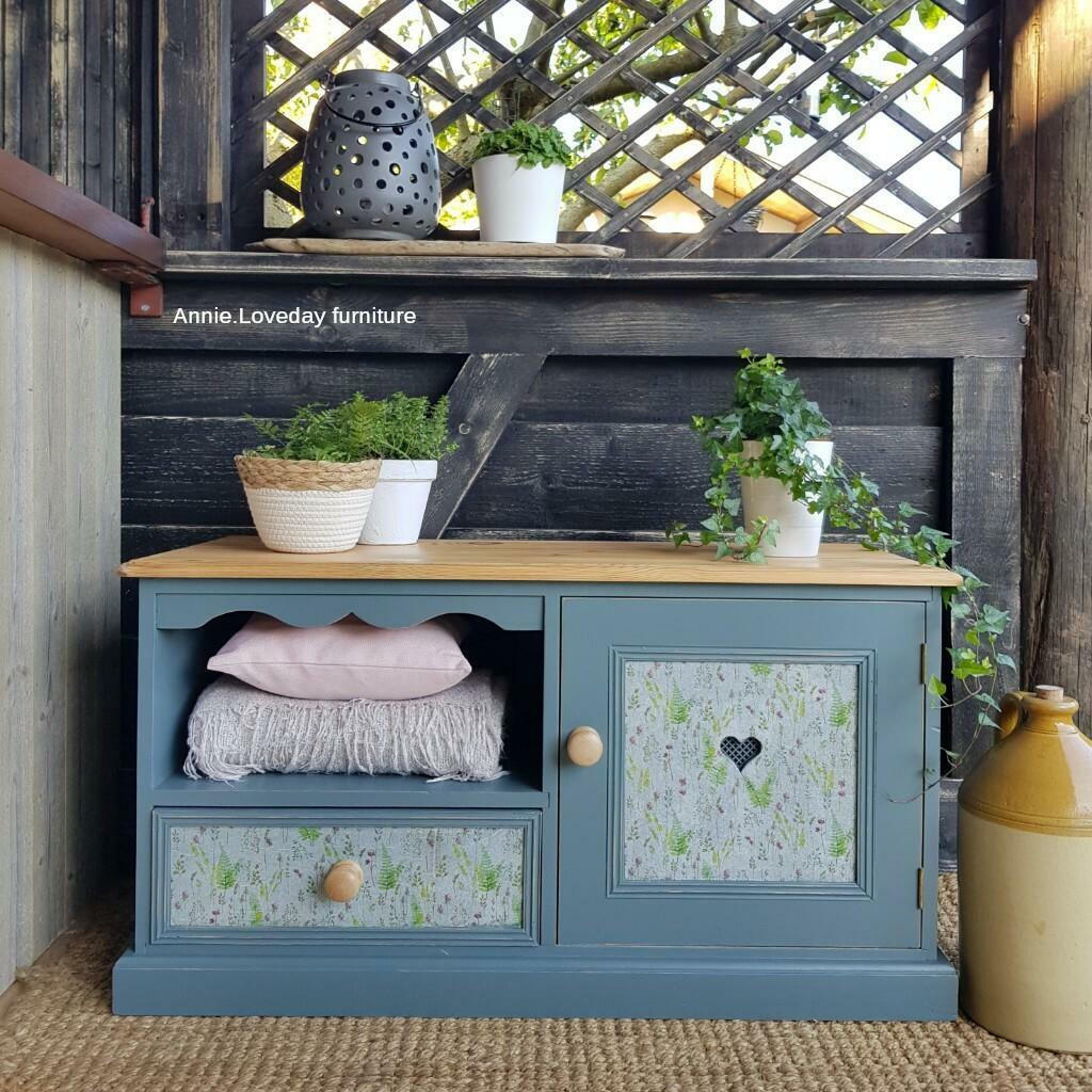 Dixie Belle Paint Stormy Seas Chalk Mineral Paint is the perfect paint for any DIY project!
Beautiful low cabinet painted in Stormy Seas Chalk Mineral Paint with natural wood hardware and top. Staged with flower pots and greenery.