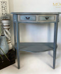 Dixie Belle Paint Stormy Seas Chalk Mineral Paint is the perfect paint for any DIY project!
Small console table painted in Stormy Seas Chalk Mineral Paint with black hardware.