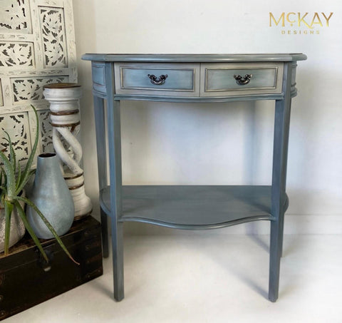 Dixie Belle Paint Stormy Seas Chalk Mineral Paint is the perfect paint for any DIY project!
Small console table painted in Stormy Seas Chalk Mineral Paint with black hardware.