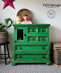 Dixie Belle Paint Tree Frog Green Chalk Mineral Paint is the perfect paint for any DIY project!  A green chalk painted dresser with black edges and chrome pull knobs.