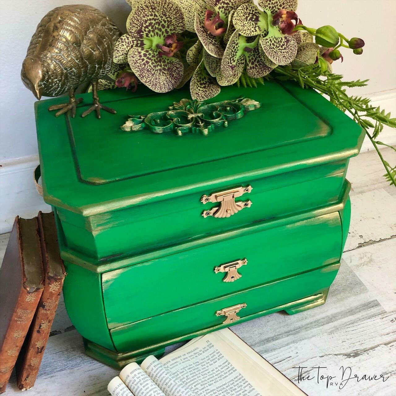 Dixie Belle Paint Tree Frog Green Chalk Mineral Paint is the perfect paint for any DIY project!  A green chalk painted wooden jewelry box with gold pull knobs.