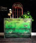 Dixie Belle Paint Tree Frog Green Chalk Mineral Paint is the perfect paint for any DIY project!  A yellow, green and black ombre blended chalk painted dresser with gold handles.
