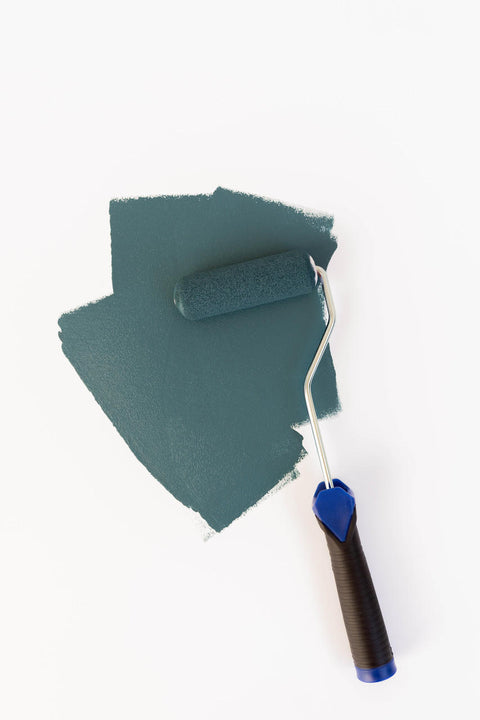 Smooth Roller used on a white background with a greenish blue paint.