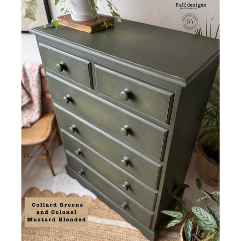 A tall green dresser with six drawers, with a slightly distressed finish. It's surrounded by plants and decor, including a woven chair and a patterned blanket. Text on the image reads "Collard Greens and Colonel Mustard Blended."