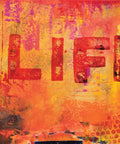 Image of Life Rice Decoupage Paper. Red, yellow and orange design with "Life" written across the paper along with some Mandarin writing.