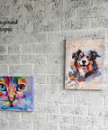 Two colorful animal portraits hang on a white textured brick wall. The left painting depicts a vibrant, abstract cat in shades of purple, blue, pink, and green. The right painting features a lively, multicolored dog. A "Reimagined Designs" logo is on the upper left corner.