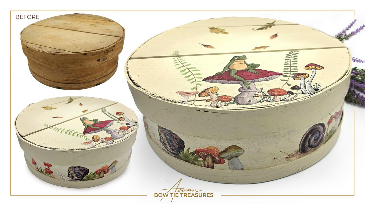 Cream painted wooden circular storage box. Mr. Toad's Transfer has been applied on the side of the box and on the lid.