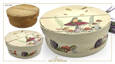 Cream painted wooden circular storage box. Mr. Toad's Transfer has been applied on the side of the box and on the lid.