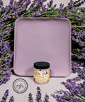 Wooden tray painted with Secret Path Chalk Mineral Paint. Staged with lavender surrounding the wooden tray and paint jar.