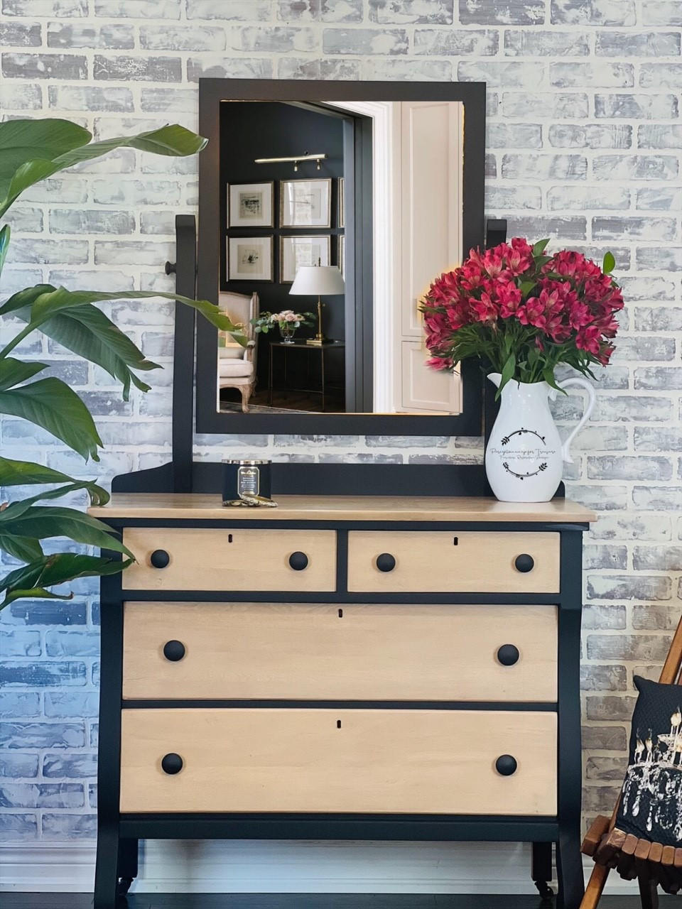 Anchor Silk All-In-One paint is perfect for painting kitchen cabinets, bathroom cabinets and painting furniture. Natural wood dresser with frame and hardware painted in Anchor Silk All-In-One Mineral Paint. Staged against whitewashed brick wall with red flowers and candle jar.