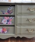 Cactus Silk All-In-One paint is perfect for painting kitchen cabinets, bathroom cabinets and painting furniture.
Dresser with open drawers on the left side painted in Cactus Silk All-In-One paint with the Flower Child - Transfer on the drawers.
